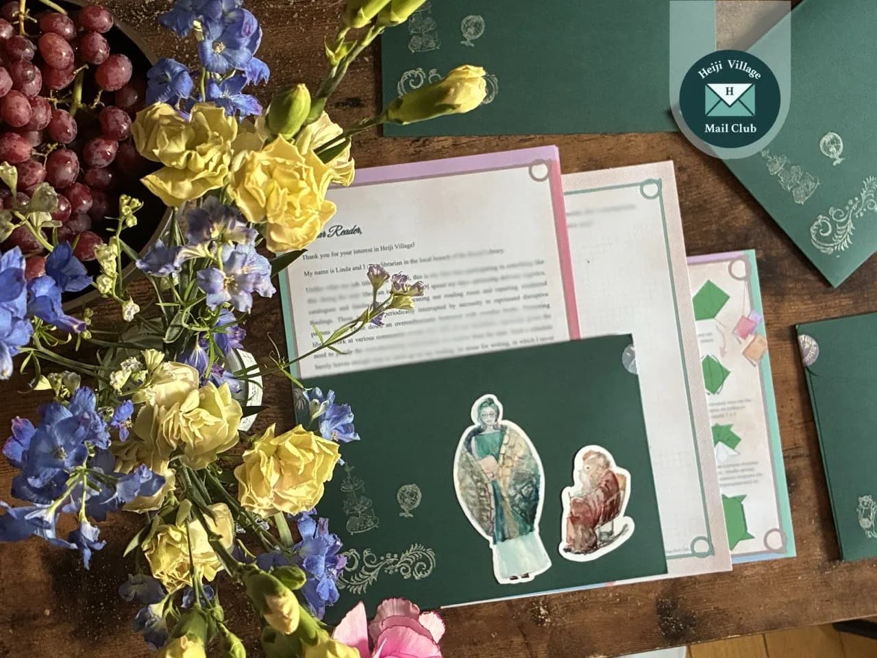 Flowers and illustrated materials from the August letter